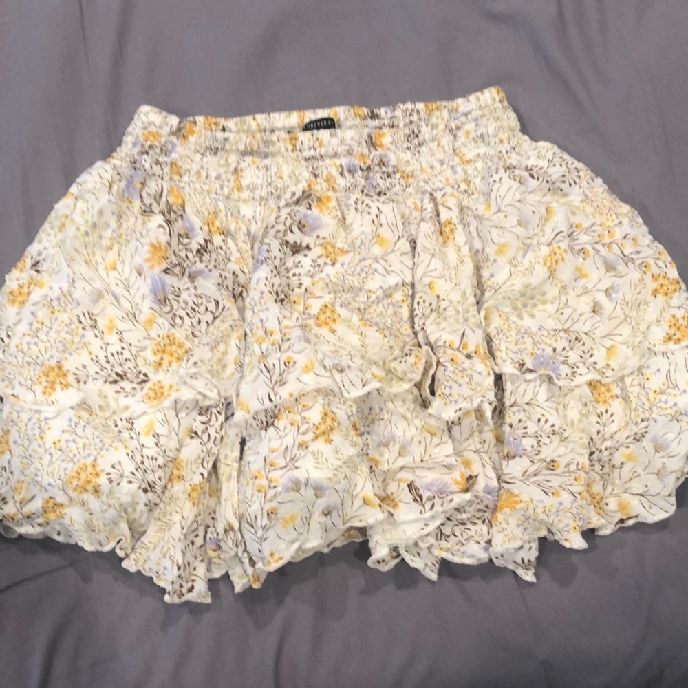 This is a large white mini skirt from forever 21